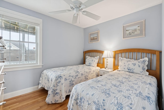 42 Rachel Carson Ln, Wells, ME 04090 - bedroom featuring wood finished floors and a ceiling fan