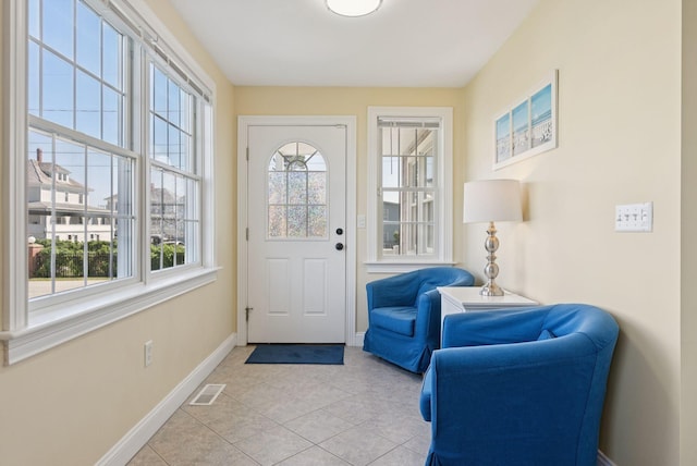 42 Rachel Carson Ln, Wells, ME 04090 - foyer with baseboards and light tile patterned floors
