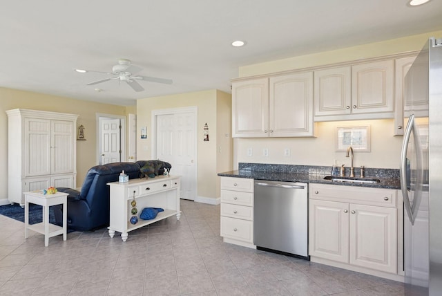 42 Rachel Carson Ln, Wells, ME 04090 - kitchen with appliances with stainless steel finishes, open floor plan, a ceiling fan, dark stone counters, and recessed lighting