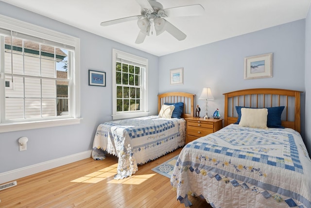 42 Rachel Carson Ln, Wells, ME 04090 - bedroom featuring wood finished floors and ceiling fan