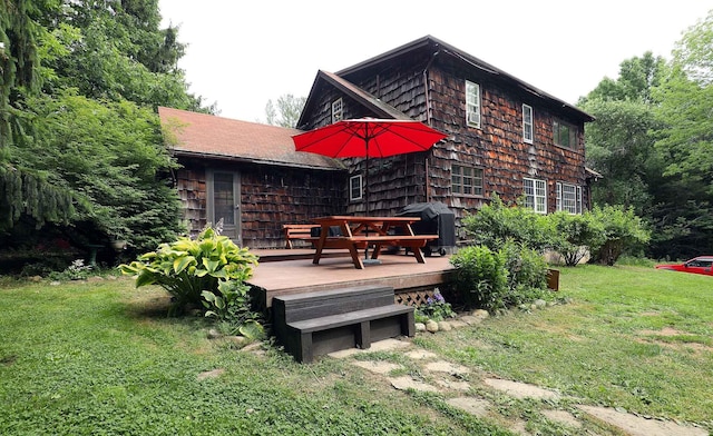 32 Williams Rd, Chelsea, ME 04330 - back of property with a deck and a yard