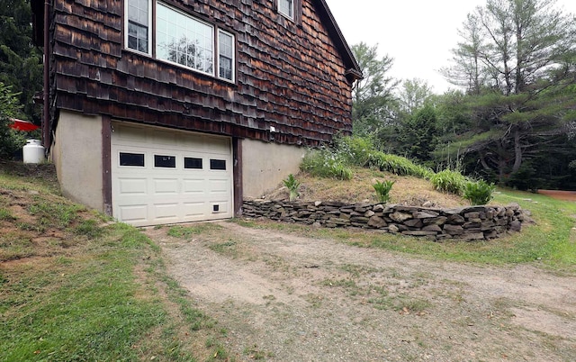 32 Williams Rd, Chelsea, ME 04330 - garage featuring driveway