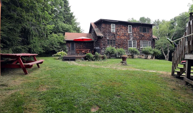 32 Williams Rd, Chelsea, ME 04330 - view of grassy yard featuring a deck and stairway