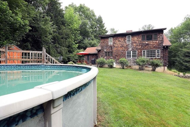 32 Williams Rd, Chelsea, ME 04330 - outdoor pool featuring a lawn and a deck