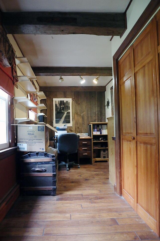 32 Williams Rd, Chelsea, ME 04330 - home office featuring beam ceiling, wood finished floors, and wooden walls
