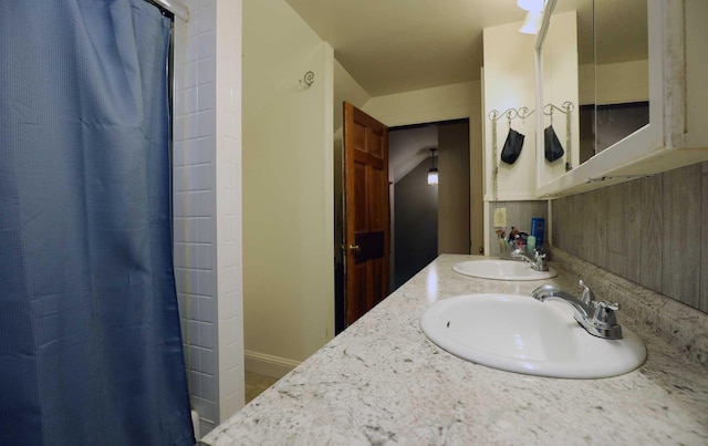 32 Williams Rd, Chelsea, ME 04330 - full bathroom with double vanity and a shower with curtain