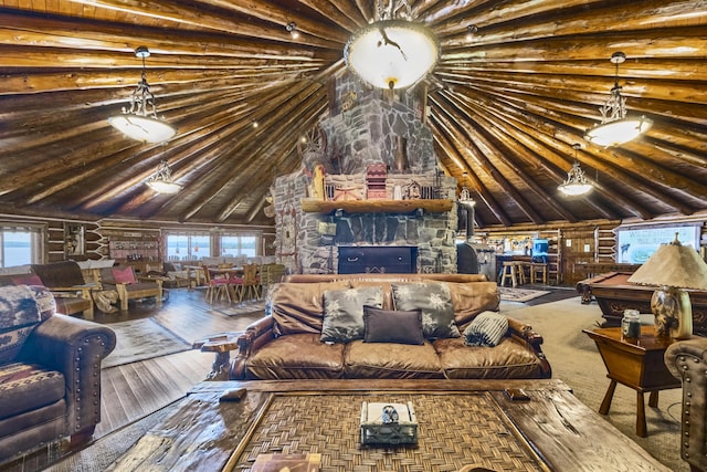 1 Zella Is Unit T14 R8, Wels, ME 04768 - living room featuring plenty of natural light, hardwood / wood-style floors, vaulted ceiling, log walls, and wood ceiling