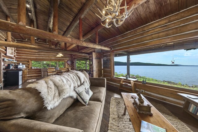 1 Zella Is Unit T14 R8, Wels, ME 04768 - sunroom with a chandelier and a water view