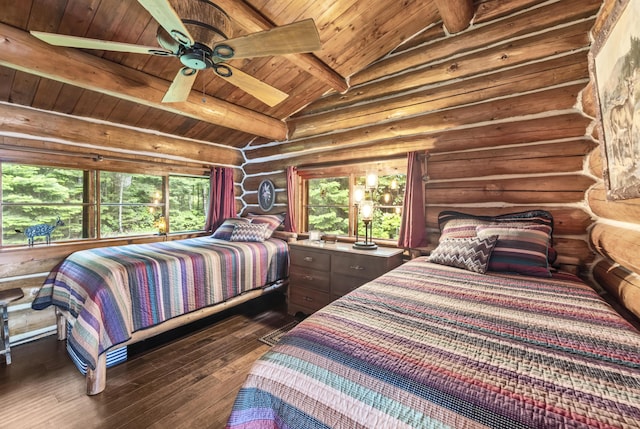 1 Zella Is Unit T14 R8, Wels, ME 04768 - bedroom with multiple windows, rustic walls, dark wood-type flooring, wood ceiling, and a ceiling fan