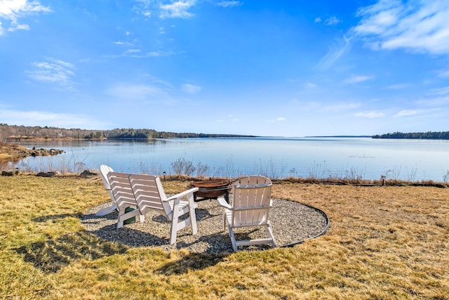 74 Spindle Rd, Ellsworth, ME 04605 - view of yard with a water view and an outdoor fire pit