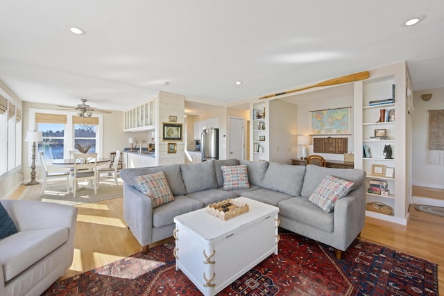 74 Spindle Rd, Ellsworth, ME 04605 - living room featuring light wood-type flooring, ceiling fan, built in shelves, and recessed lighting