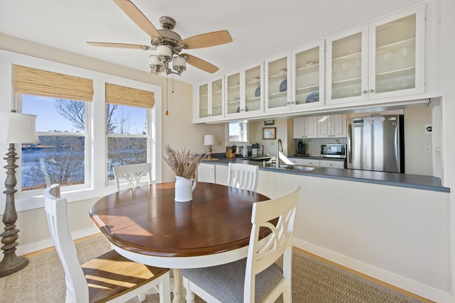 74 Spindle Rd, Ellsworth, ME 04605 - dining space featuring ceiling fan and baseboards
