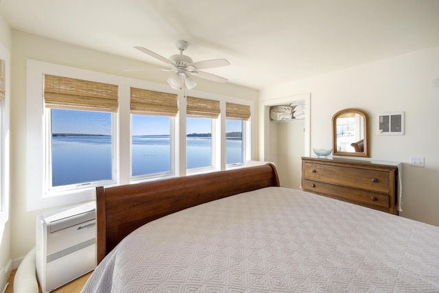 74 Spindle Rd, Ellsworth, ME 04605 - bedroom featuring a water view and a ceiling fan