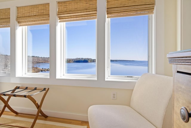 74 Spindle Rd, Ellsworth, ME 04605 - sitting room featuring wood finished floors and a water view