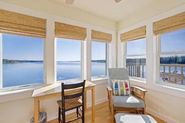 74 Spindle Rd, Ellsworth, ME 04605 - sunroom / solarium with wood finished floors and a water view