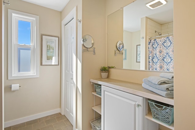 74 Spindle Rd, Ellsworth, ME 04605 - full bathroom with vanity, a shower with shower curtain, and tile patterned floors