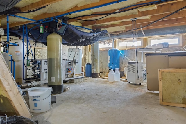 74 Spindle Rd, Ellsworth, ME 04605 - basement featuring a water pressure tank and healthy amount of natural light