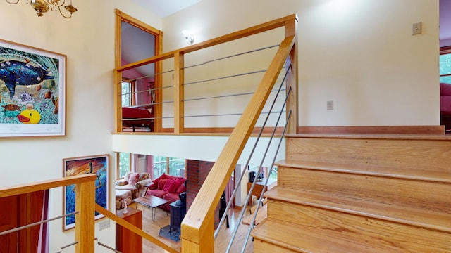 93 Hopkins Rd, Hampden, ME 04444 - staircase with plenty of natural light and wood finished floors