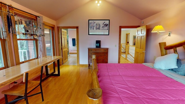 93 Hopkins Rd, Hampden, ME 04444 - bedroom with vaulted ceiling and light wood-style flooring