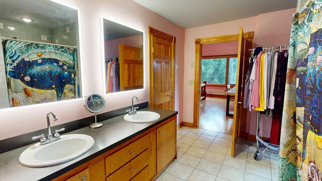 93 Hopkins Rd, Hampden, ME 04444 - full bath with double vanity, tile patterned floors, and a shower with curtain
