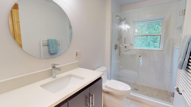 93 Hopkins Rd, Hampden, ME 04444 - bathroom featuring vanity, a towel warmer, and a shower stall