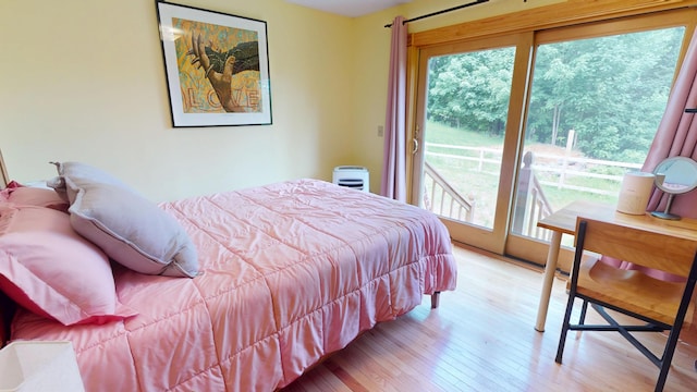 93 Hopkins Rd, Hampden, ME 04444 - bedroom with access to outside and light wood-type flooring