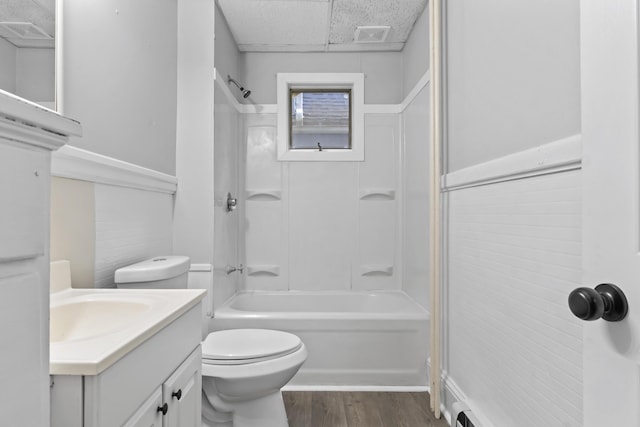 13 Newman St, Lewiston, ME 04240 - bathroom featuring vanity, a paneled ceiling, wood finished floors, and bathtub / shower combination