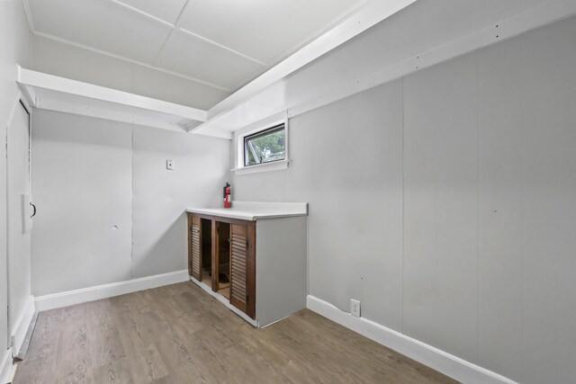 13 Newman St, Lewiston, ME 04240 - basement with wood finished floors and baseboards