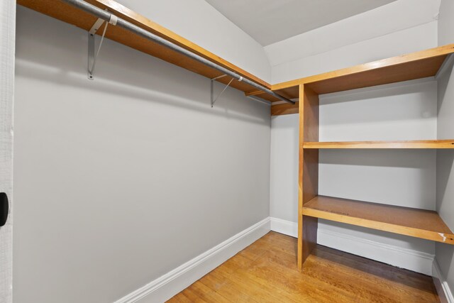 13 Newman St, Lewiston, ME 04240 - spacious closet featuring wood finished floors