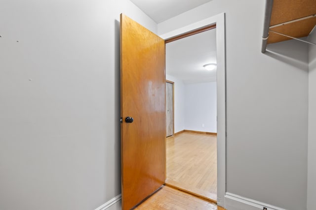 13 Newman St, Lewiston, ME 04240 - corridor featuring light wood-style flooring and baseboards