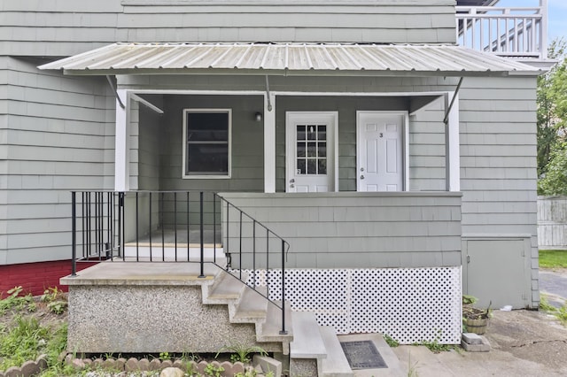 13 Newman St, Lewiston, ME 04240 - doorway to property featuring a metal roof