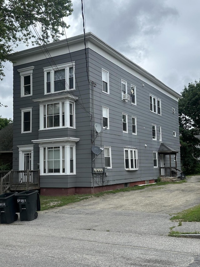 95 Wood St, Lewiston, ME 04240 - view of side of home with cooling unit