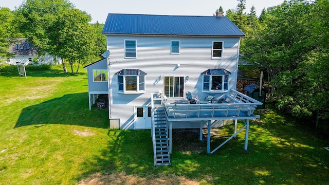 119 Merritt Rd, Steuben, ME 04680 - rear view of property with stairs, a yard, a deck, and a metal roof