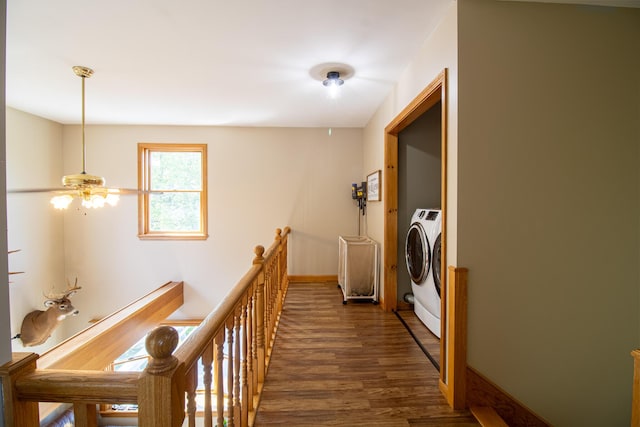 119 Merritt Rd, Steuben, ME 04680 - corridor featuring an upstairs landing, dark wood-style flooring, and independent washer and dryer