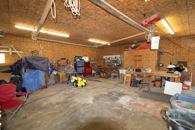 119 Merritt Rd, Steuben, ME 04680 - garage with a workshop area