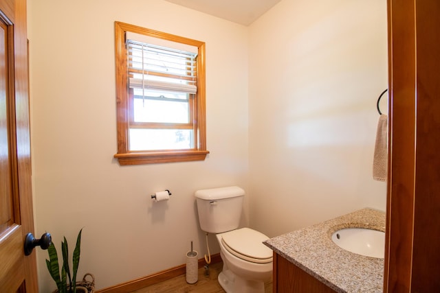 119 Merritt Rd, Steuben, ME 04680 - bathroom with vanity and wood finished floors