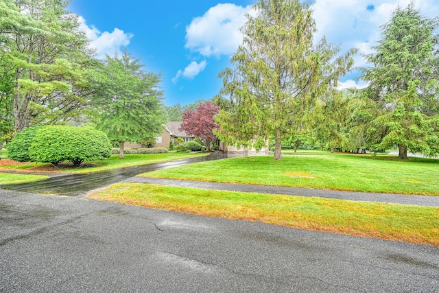 3 Tallwood Rd, Augusta, ME 04330 - view of front of house with a front yard and driveway