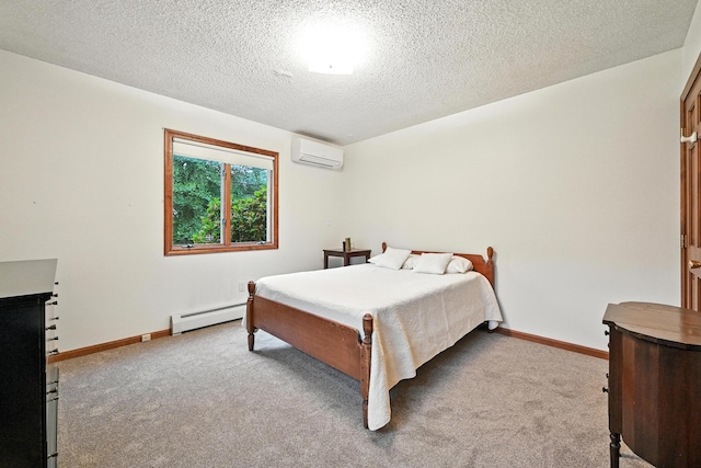 3 Tallwood Rd, Augusta, ME 04330 - bedroom with a wall mounted air conditioner, baseboard heating, carpet floors, and a textured ceiling