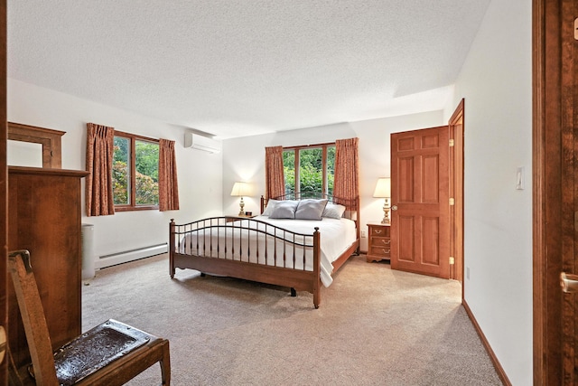 3 Tallwood Rd, Augusta, ME 04330 - carpeted bedroom featuring baseboard heating, a textured ceiling, and a wall mounted air conditioner