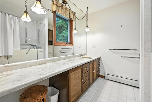 3 Tallwood Rd, Augusta, ME 04330 - bathroom featuring a baseboard heating unit, vanity, and shower / tub combo with curtain