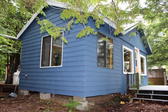 8 Drake Ln, Oakfield, ME 04763 - view of home's exterior featuring a deck