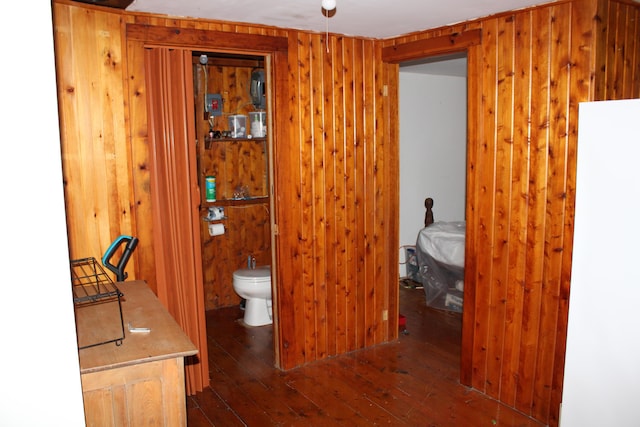 8 Drake Ln, Oakfield, ME 04763 - bathroom featuring wood-type flooring, wood walls, and vanity