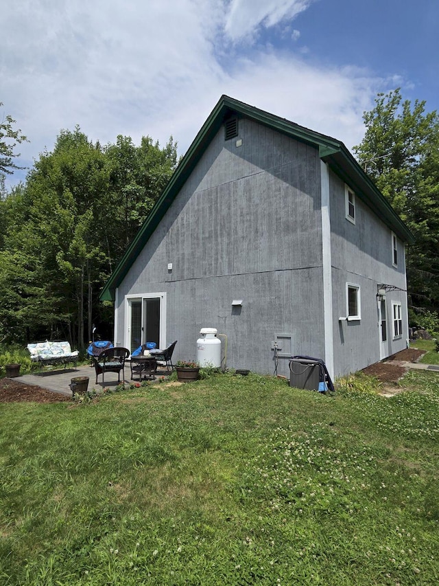 340 Campground Rd, Anson, ME 04958 - rear view of property featuring a lawn and a patio
