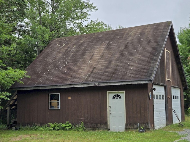 340 Campground Rd, Anson, ME 04958 - view of front of home with a detached garage, an outdoor structure, and a shingled roof