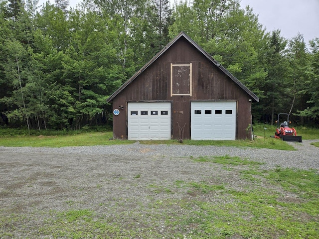340 Campground Rd, Anson, ME 04958 - detached garage featuring a wooded view