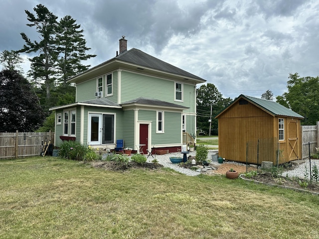 72 Federal Rd, Parsonsfield, ME 04047 - back of property with a chimney, a storage shed, and entry steps