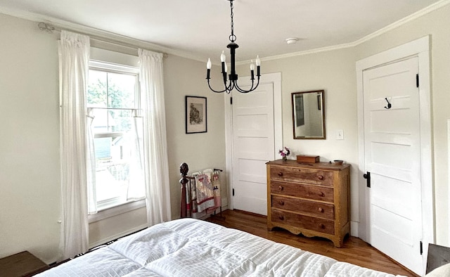 72 Federal Rd, Parsonsfield, ME 04047 - bedroom with crown molding, a chandelier, and wood finished floors