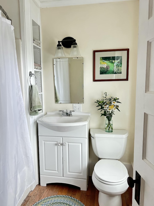 72 Federal Rd, Parsonsfield, ME 04047 - full bath featuring wood finished floors, vanity, and a shower with curtain