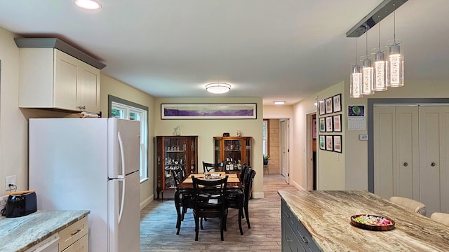 62 Cobb Rd, Stetson, ME 04488 - dining area featuring light wood-style floors and recessed lighting