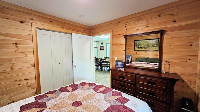 62 Cobb Rd, Stetson, ME 04488 - bedroom featuring wooden walls, a closet, and wood finished floors